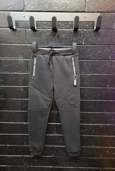 CRKD Embossed Trackpants by Cracked Soda